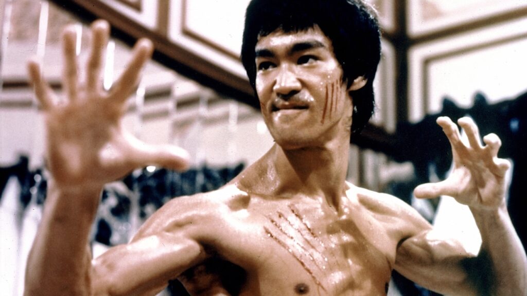 Kung Fu: clássicos de Jackie Chan e Bruce Lee ganham restauração com IA 3 Restauração de filmes clássicos de Kung Fu com IA, incluindo títulos de Jackie Chan e Bruce Lee – Divulgação/Warner Bros. Pictures