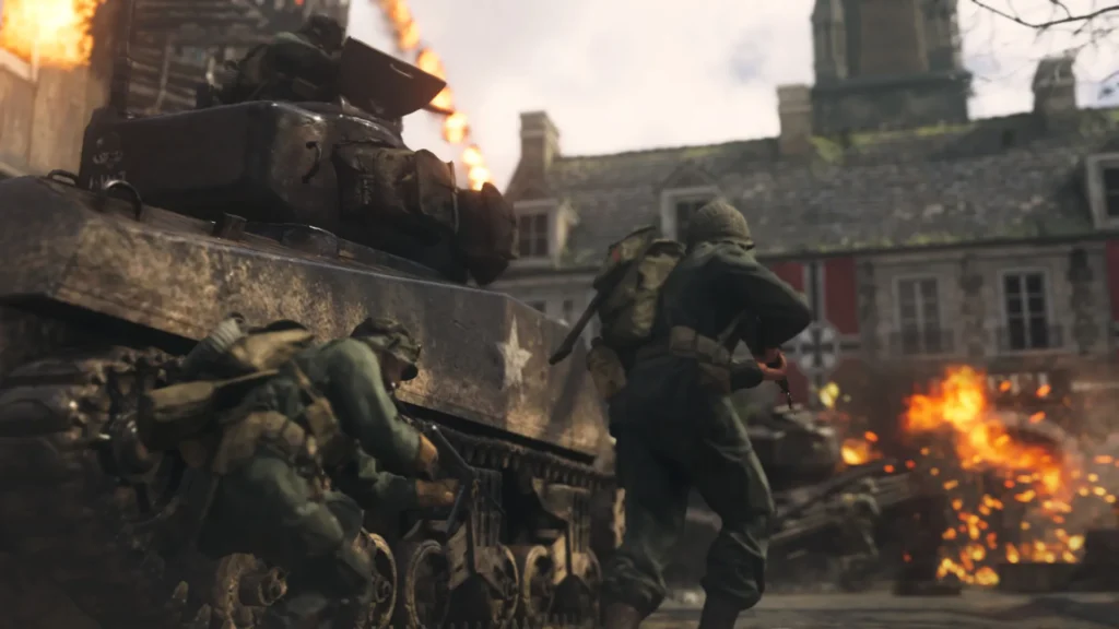 Call of Duty removido do PC após ataque hacker, confirma fonte 1 Imagem promocional do jogo Call of Duty: WWII mostrando ação militar intensa, com ênfase em cenário da Segunda Guerra mundial, destacando personagem principal, bandeira dos Estados Unidos e ambiente de combate.