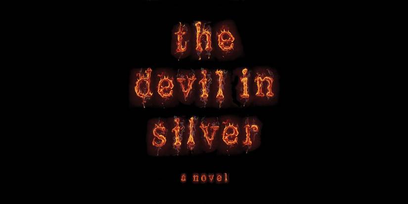 Capa do livro The Devil In Silver com letras em fogo