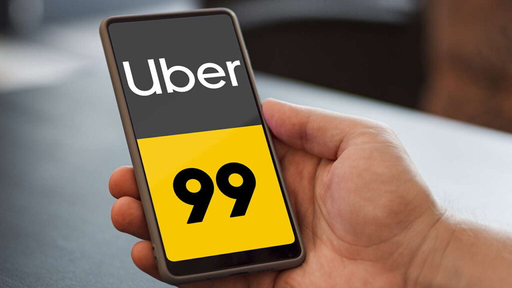 Preços altos na Uber e 99 geram polêmica no fim do ano 2 Logos da Uber e 99 sobre fundos amarelo e preto