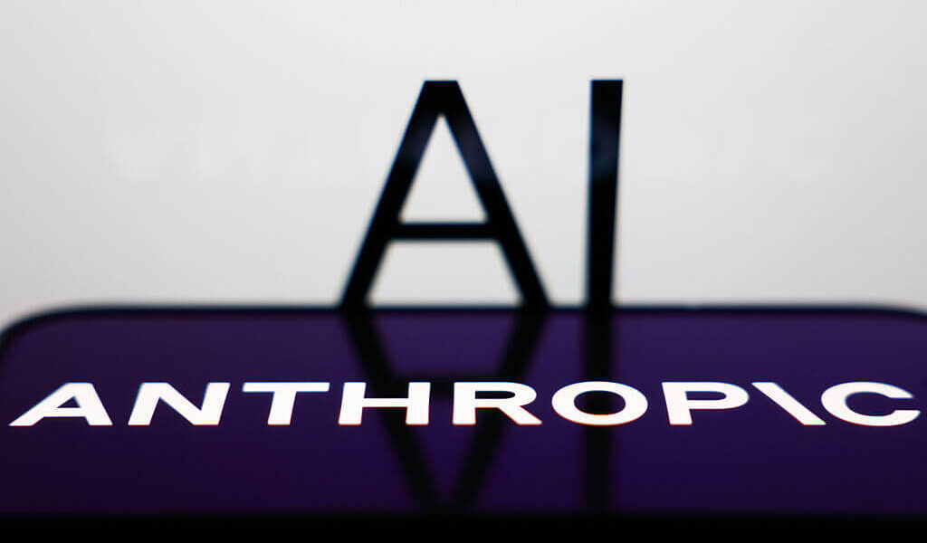 Logo da Anthropic exibido em tela e símbolo de IA.