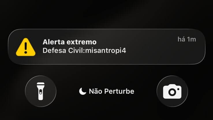 Alerta da Defesa Civil com mensagem misantropia em smartphone no Brasil