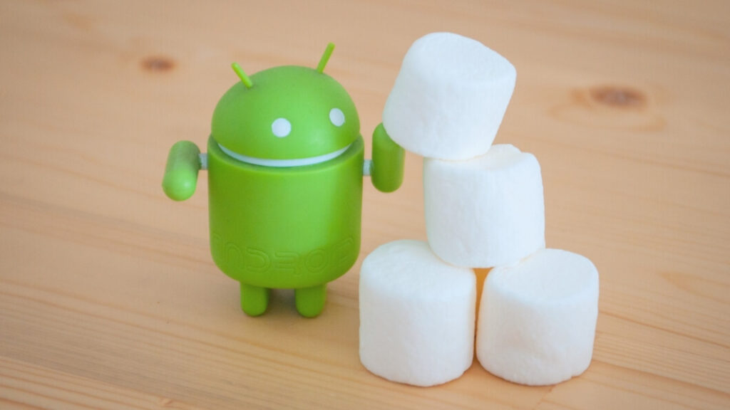 Robô Android ao lado de marshmallows representa o Android 6.0 Marshmallow
