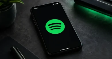 Logo do Spotify em celular ilustra falha ao seguir e bloquear perfis